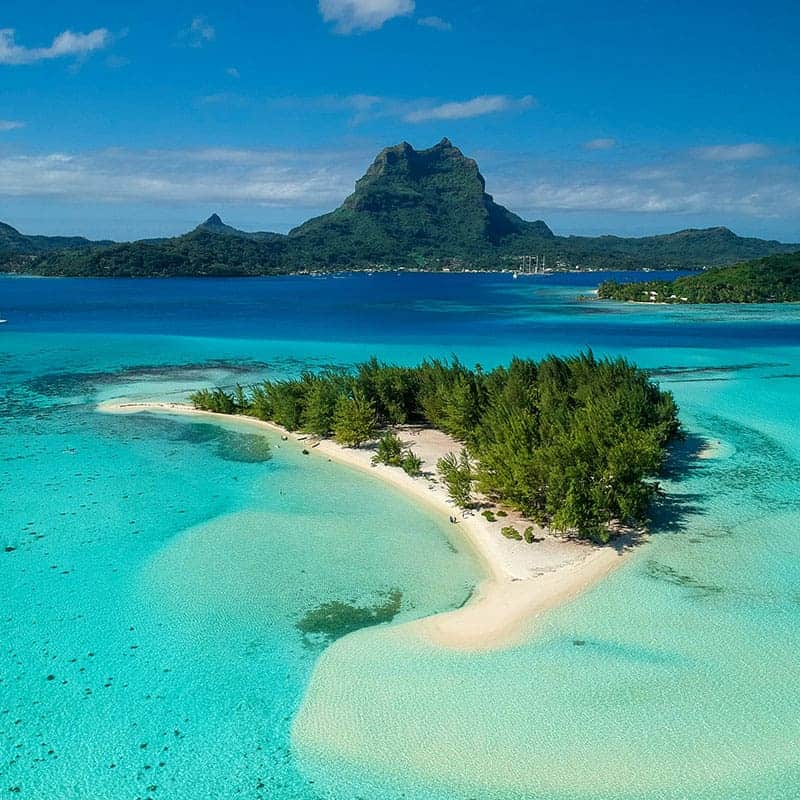 Aerial view of Moorea's lagoon with its bays and turquoise water